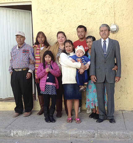 Leandra Becerra Lumbreras's family, photographed in front of the family's home in Zapopan, Mexico.