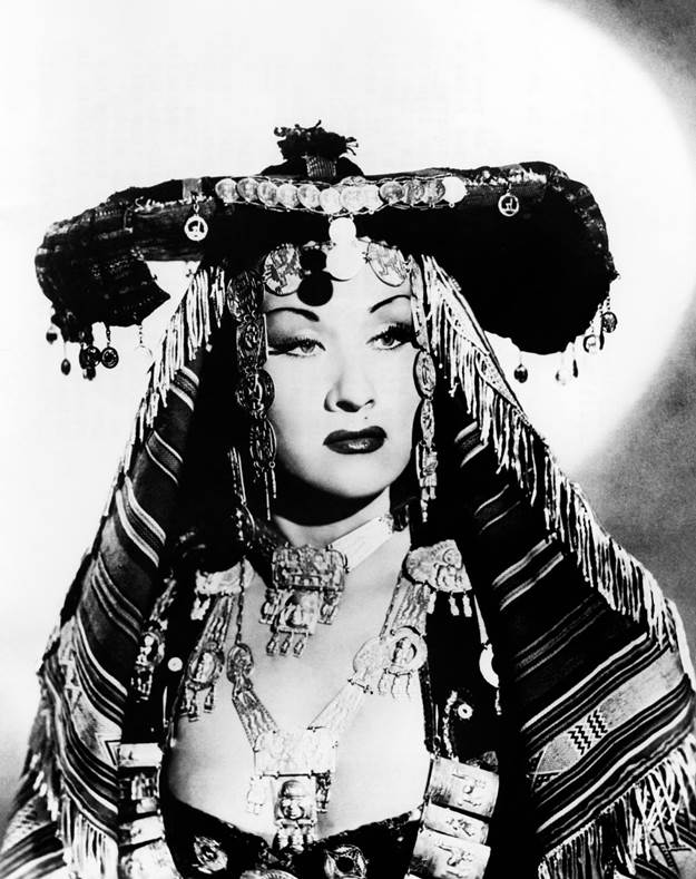 Peruvian singer Yma Sumac in indigenous-style regalia in 1952.
