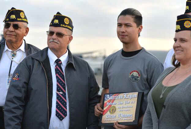 Aboard the USS IOWA, American Legion Post 61 Commander Terry Bonich presents Victor Quinonez with a certificate of recognition for his actions in capturing his teachers profanity-laced classroom rant against the military. The video has since gone viral and the teacher is on paid leave by the district as the incident is investigated. San Pedro February 10, 2018. Photo by Brittany Murray, Daily Breeze/SCNG
